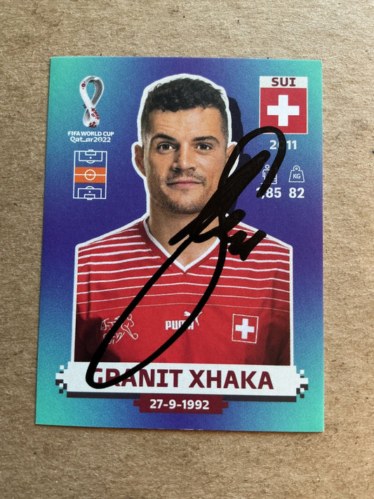 Granit Xhaka, Switzerland 🇨🇭 FIFA World Cup 2022 Panini hand signed - Autographs-World