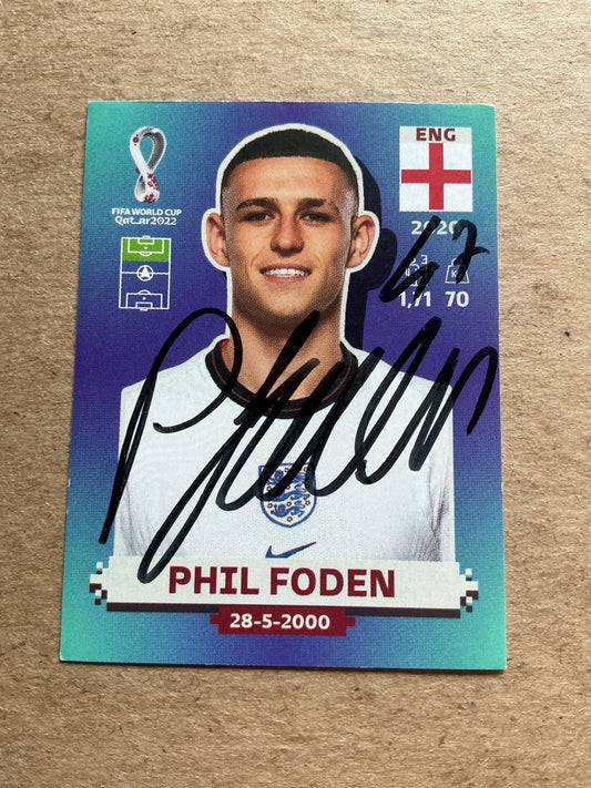 Phil Foden, England 🏴󠁧󠁢󠁥󠁮󠁧󠁿 FIFA World Cup 2022 Panini hand signed - Autographs-World